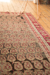 Antique Armenian Karabagh carpet with staggered boteh pattern and rich red border.