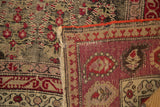 Hand-knotted Karabagh rug detail showing secure edge, fringe, and dense reverse weave.