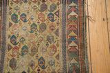Antique Caucasian runner: arrowed border, Laleh Abassi motif, boteh field, and worn edge.