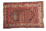 Aged antique Hamadan rug, early 20th century, with navy boteh and madder red vine border.