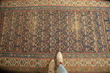 Antique Kurdish rug runner, allover henna plant motif in navy, madder root red, with foundation showing.