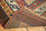 Antique Serab rug corner detail, showing geometric pattern, overcast end, and visible foundation.