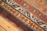 Antique Serab runner border detail with unusual aubergine, madder red, and blue geometric designs.