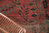 Visible foundation wear on antique Lilihan rug with dusty raspberry and navy vinery.