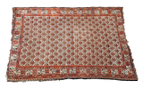 Antique Ivory Hamadan rug with distressed ivory field, allover floral pattern, unique rose border.