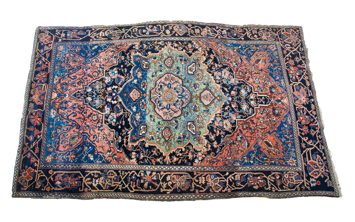 Antique Persian Farahan Sarouk rug, royal blue, seafoam medallion with abrash, and coral floral design.
