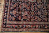 Antique Mahal rug corner, Herati motif, madder red borders, powder blue selvage, tattered fringe.