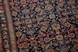 Intricate Herati motif on deep indigo field, with a patterned border and powder blue selvage.
