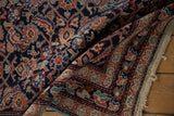 Antique Mahal rug corner, intricate Herati motif in indigo, madder red, beige, with original fringe.