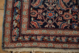 Antique Mahal rug corner: powder blue selvage, intricate borders, Herati motifs, fringe.