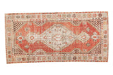 Distressed Oushak rug with cherry red field, ivory geometric medallion, light wear, 2'7