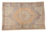 Distressed vintage Oushak rug, octagonal medallion, faded orange, blue, sand. Size 3'6