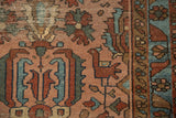 Antique Persian Lilihan runner with geometric bird, floral motifs in rose, teal, and rust.