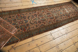 Persian Lilihan rug's side border and dusty blush field showing wear to knot heads and foundation etching.