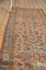 Antique Lilihan runner with rose field, geometric birds, sky blue motifs, and foundation etching.