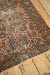Antique Lilihan rug corner, showing geometric border in teal and madder root red, with birds.