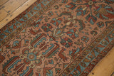 Detail of Antique Lilihan runner: rose field, intricate floral, and stylized bird motifs.