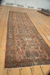 Early 20th century Persian Lilihan runner, geometric floral bouquets, birds, and visible knot head wear.