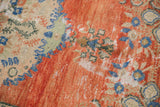 Detail of distressed Oushak runner's worn texture, exposed foundation, and vibrant colors.