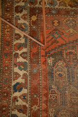 Antique Northwest Persian rug with madder root red and ivory geometric border, foundation and knot heads visible.