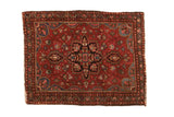 Vintage Farahan Sarouk rug, cherry red floral field, central medallion, blue tendrils.