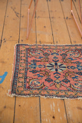 Antique Lilihan square rug mat with rose field, blue floral pattern, and aged fringe.
