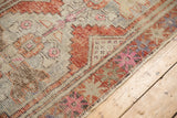 Distressed Oushak runner with faint foundation showing through, featuring rust, ivory, and hot pink.