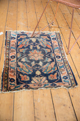 Antique Persian Lilihan rug mat's tattered fringe and faded rose outer border.