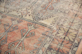 Distressed Oushak runner: faded red tree-of-life, slate blue geometrics, and worn texture.