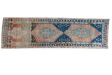 Distressed vintage Oushak runner with blush and sky blue triple medallions, 2'11