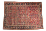 Vintage Heriz carpet, cherry red allover cloud band and samovar pattern, dark blue floral borders.