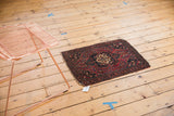Antique Farahan Sarouk rug: transitional style, scalloped medallion, cherry red, and navy florals.