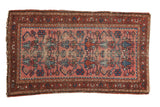 Vintage Lilihan rug runner featuring allover oversized motifs in blush, blue, and red.