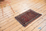 Vintage Lilihan Persian rug with allover floral bouquet motif on deep burgundy, 2' x 2'11