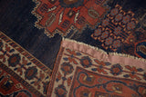Antique Fine Afshar rug reverse, light tatter fringe, and geometric red, blue, ivory border.