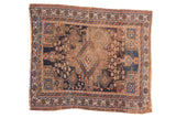 Antique Afshar Persian rug, navy, apricot, sky blue geometric medallion, vase motifs, storied wear.
