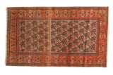 Vintage Persian Doroksh rug, hand-knotted with allover tangerine, ivory, navy paisley boteh design, 3'1