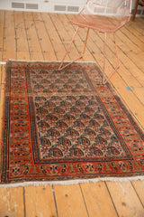 Vintage Persian Doroksh rug, allover paisley boteh motif in tangerine orange and ivory.