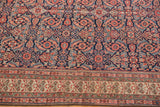 Antique Mission Malayer rug showing the navy Herati field and ivory germinating plant main border.