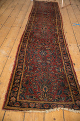 Vintage Lilihan Persian runner: allover black cherry red, dark navy floral pattern, low pile, worn edges.
