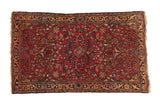 Hand-knotted Vintage Lilihan rug, black cherry red with allover floral vinery and shadow medallion.