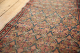 Antique Serab runner's paneled lattice pattern in madder root red, natural camel, and blue.