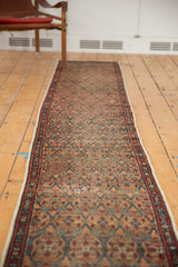 Antique Serab runner featuring paneled lattice motif in camel, madder red, and sky blue.
