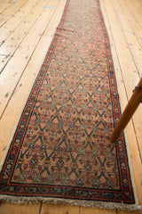 Natural fringe and paneled geometric lattice motif on this antique Serab runner end.