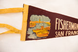 Brown felt pennant with yellow ties and San Francisco fishing boat illustration.