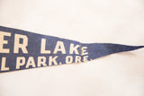 Pointed tip of vintage blue felt pennant with 
