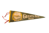 Vintage green felt Grants Pass Oregon pennant, Crater Lake graphic, red ties, 8x24 inches.