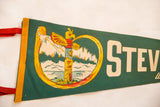 Vintage Stevens Pass pennant with colorful totem pole, mountain graphic, and 