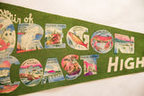 Close-up of detailed stenciled scenic images within the 'OREGON COAST' pennant letters.