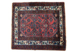 Vintage Persian Engelas square rug with a red Herati motif and a complex floral vine border.